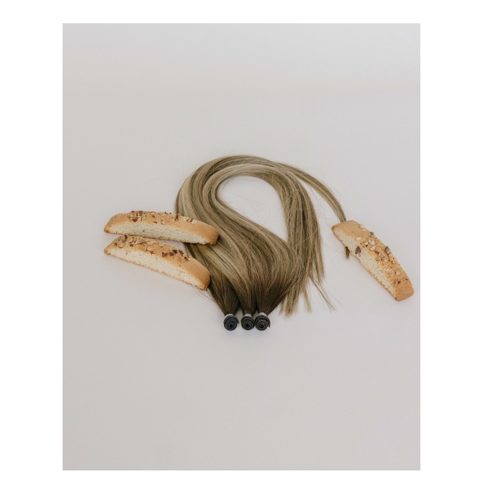 22in hand tied JZ Styles extensions in color jagger (brownish blonde)